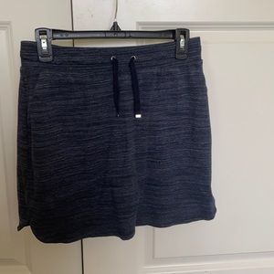 Blue skort with adjustable waistband and pockets